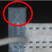 Protrusion Defective mask with protrusion detected by AI