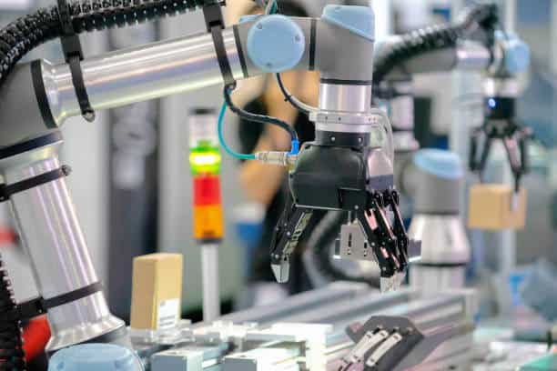 Universal Robots UR5 Collaborative Robot close-up of a Universal Robots UR5 Collaborative Robot on a production line