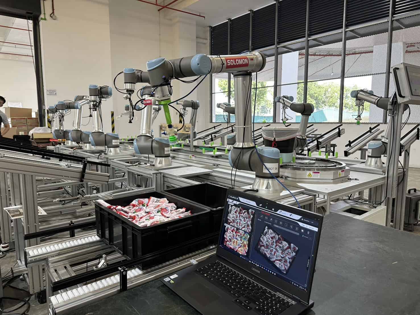 Automated Packing Using AccuPick automated packing system using 10 UR cobots and AccuPick bin picking software