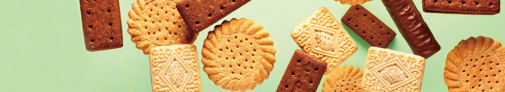 assorted classic British cookies on a blank background