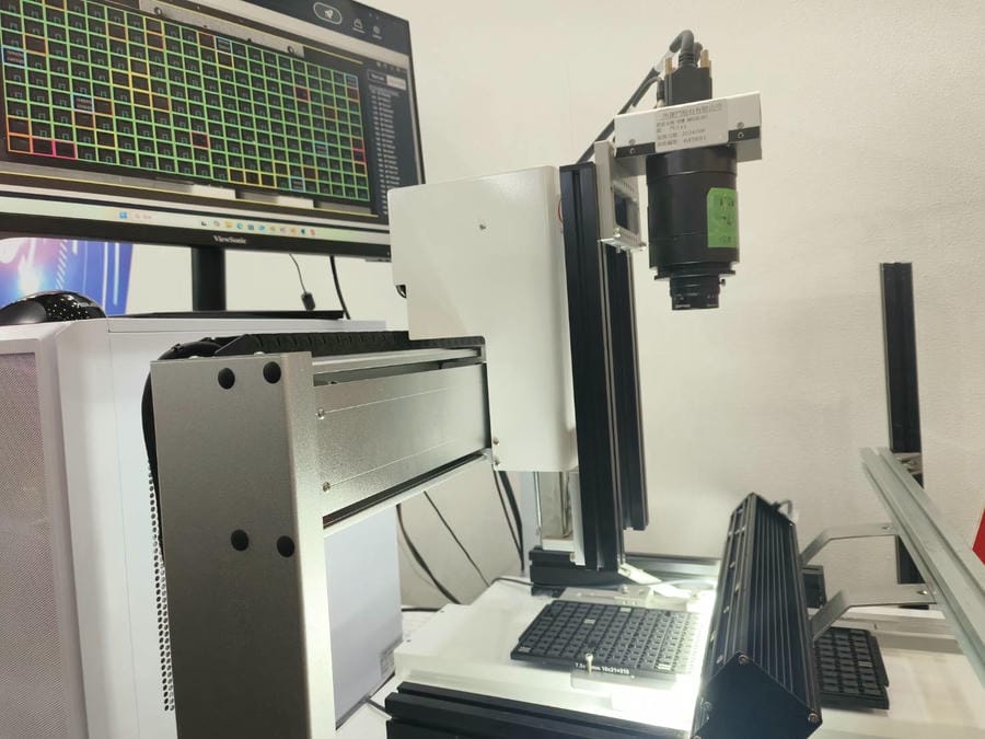 Line Scan Camera Inspection of IC Package Substrates A line scan camera, powered by SolVision AI vision software, performs automated optical inspection to examine IC package substrates for surface defects.