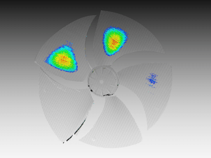 3D scan visualization of a five-bladed fan component showing color-coded heatmaps (red/yellow/green) that indicate deviation data, used for 3D matching and inspection in AI robotics.