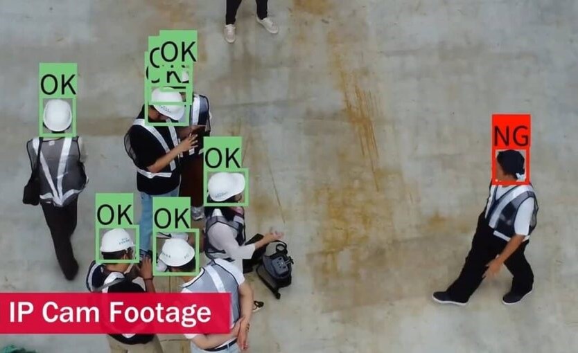 Machine Vision Safety Inspection META-aivi AR + AI industrial machine vision system detecting PPE compliance by identifying workers with and without required safety gear.
